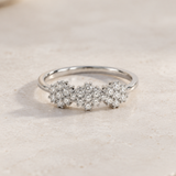 ANILLO TRES ROSETONES DE DIAMANTES