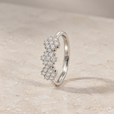 ANILLO TRES ROSETONES DE DIAMANTES