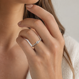 ANILLO DIAMANTE REDONDO CON BAGUETTES