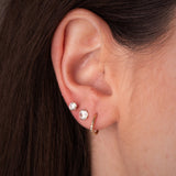 WAVY HOOP EARRINGS WITH KAMARIA ZIRCONIA