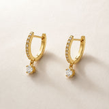 Brincos de argola com diamante pendente