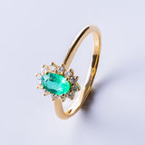 DIANE EMERALD AND DIAMOND RING