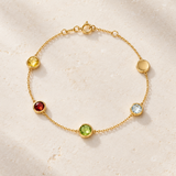 PULSERA ARCOIRIS CON GRANATE, OLIVINO, TOPACIO Y CUARZO FUME