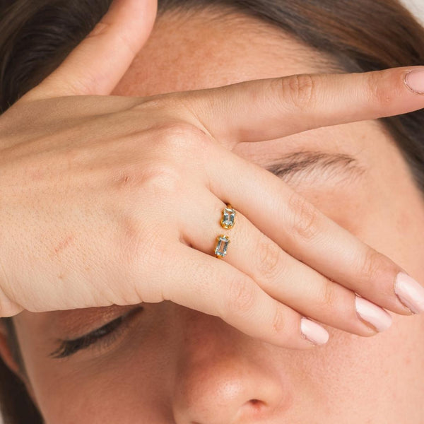 Anillo abierto Oro 18 kilates con topacios azules Usha