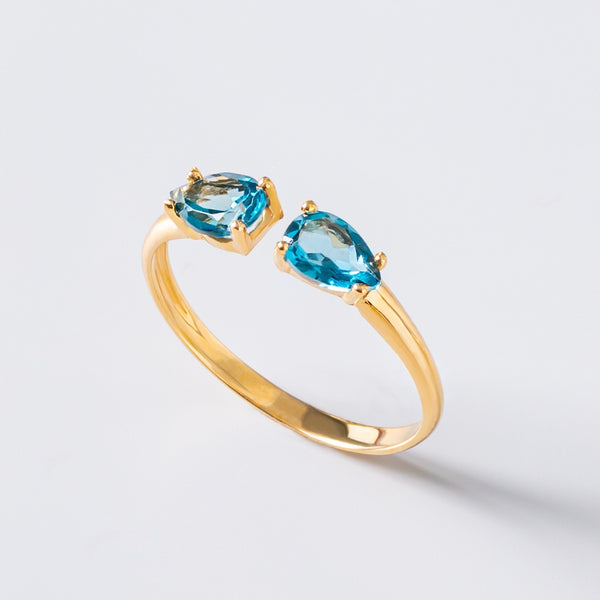 Anillo Oro 18 kilates abierto con topacios London Blue Julia