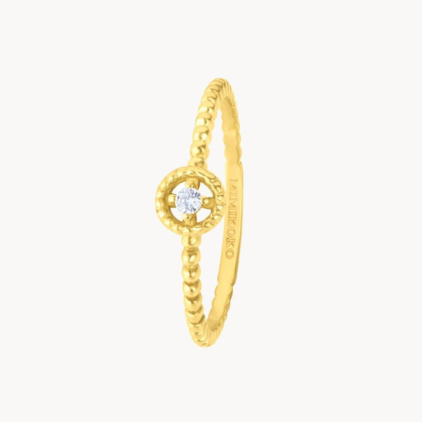 Anillo Oro 18 kilates bolas con diamante Vana