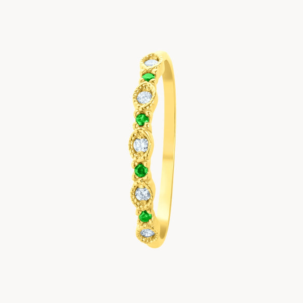 Anillo Oro 18 kilates con esmeraldas y diamantes Norma