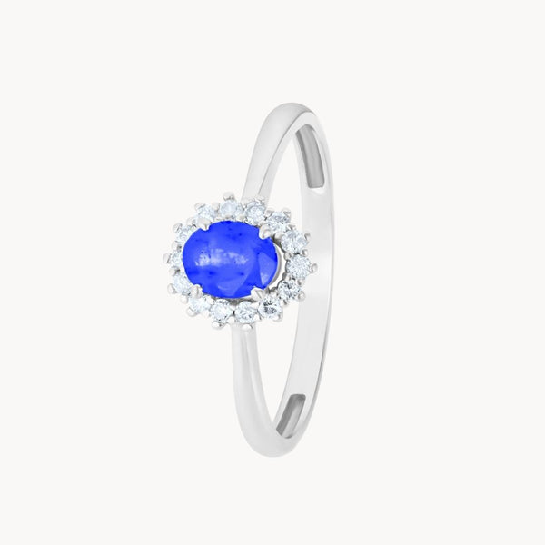 Anillo Oro blanco 18 kilates zafiro y orla diamantes Lauretta