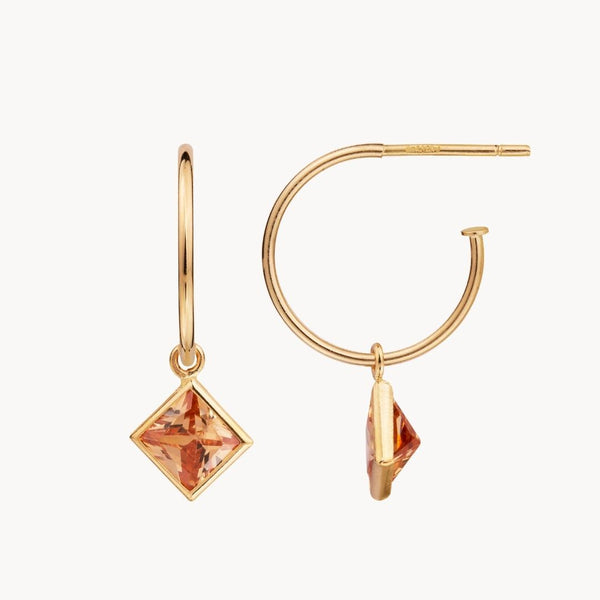 Aros Oro 18 kilates con circonita cuadrada naranja Evelin