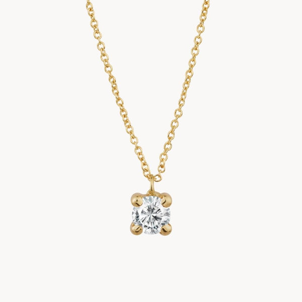 Colgante Oro 18 kilates circonita con garras Daisy