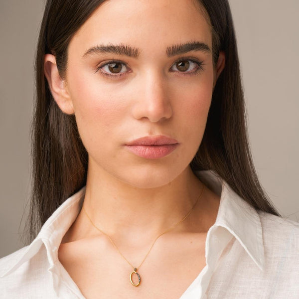 Colgante Oro 18 kt con diamantes negros o de Mimikoko