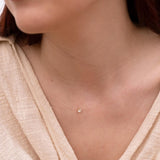 Colgante Oro 18 kilates hilo seda circonita con garras Evelyn