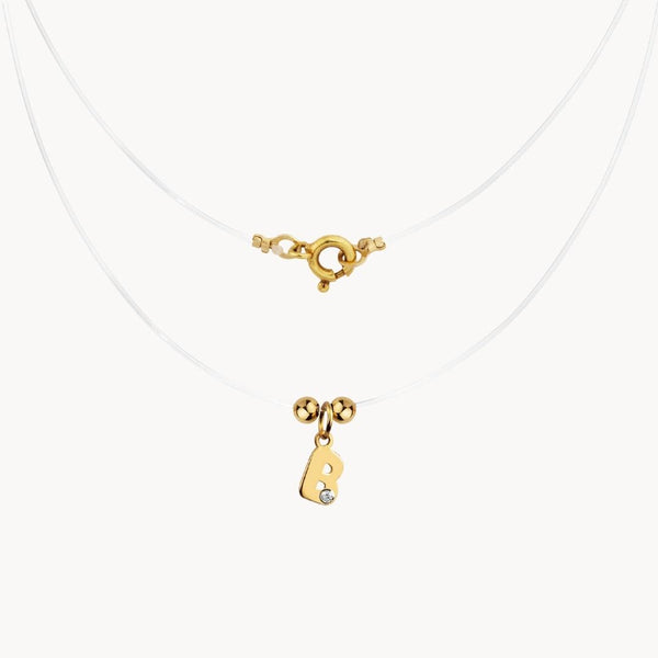 Colgante Oro 18kt hilo de seda inicial b y diamante