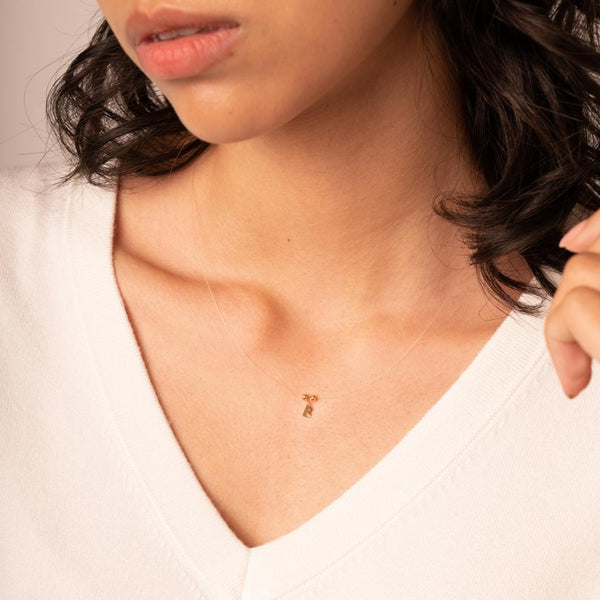 Colgante Oro 18kt hilo seda inicial diamante