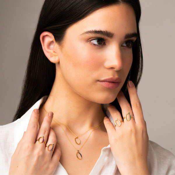 Colgante Oro 18 kt con diamantes negros o de Mimikoko