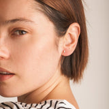 Piercing oreja Oro 18 kilates barrita con circonita Dina