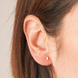 Piercing oreja Oro 18kt barrita circonita Dina