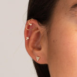 Piercing oreja Oro 18 kilates cruz con circonitas Almeda