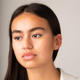 Piercing oreja Oro 18kt cruz circonitas Almeda