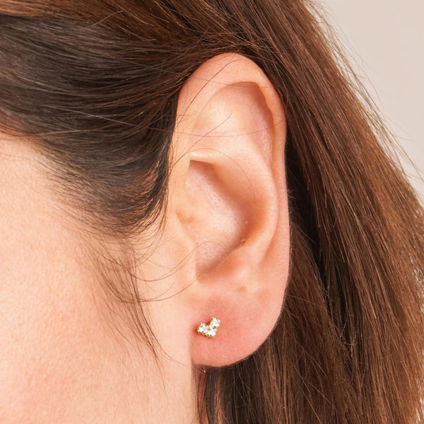 Piercing oreja Oro 18kt flecha circonitas en garras Ayana