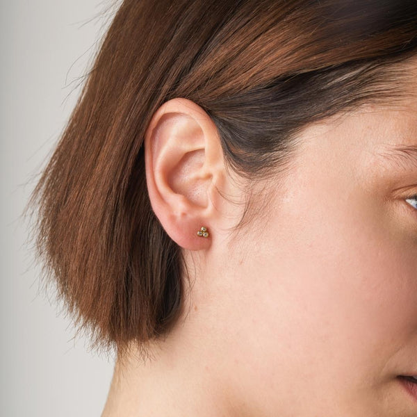 Piercing oreja Oro 18kt triangulo circonitas Deka