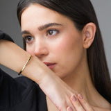 Pulsera Oro 18 kilates media caña flexible Vesta 1