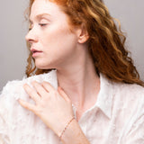 Pulsera Oro 18 kilates circonitas moradas Alba