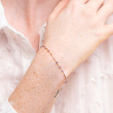 Pulsera Oro 18kt circonitas moradas Alba