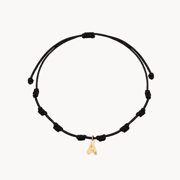 Pulsera Oro 18kt macrame inicial con diamante