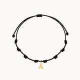 Pulsera Oro 18kt macrame inicial con diamante