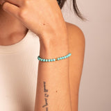 Pulsera elastica bolas de howlita azul Rachel 1