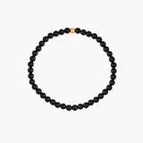 Pulsera elastica bolas de onix Rachel