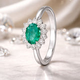 DIANE EMERALD AND DIAMOND RING