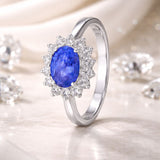 DIANE EMERALD AND DIAMOND RING