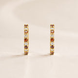 Brincos de argola com rubis e diamantes