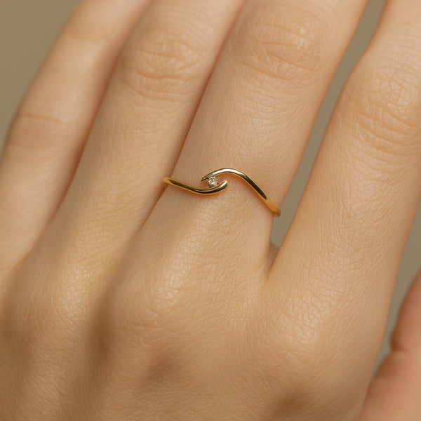 ANILLO SOLITARIO CRUZADO CON DIAMANTE 0.020 QUILATES HELENE
