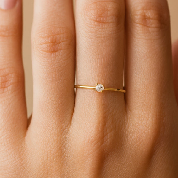 ANILLO SOLITARIO CUATRO GARRAS CON DIAMANTE 0.080 QUILATES GERTIE
