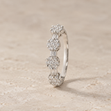 ANILLO CUATRO FLORES EN DIAMANTES BRILLANTES Y BAGUETTES