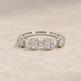 ANILLO CUATRO FLORES EN DIAMANTES BRILLANTES Y BAGUETTES