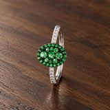ANILLO OVAL CON GRANATES TSAVORITAS Y DIAMANTES