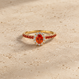 ORANGE SAPPHIRE RING WITH A DIAMOND HALO