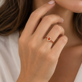 ORANGE SAPPHIRE RING WITH A DIAMOND HALO
