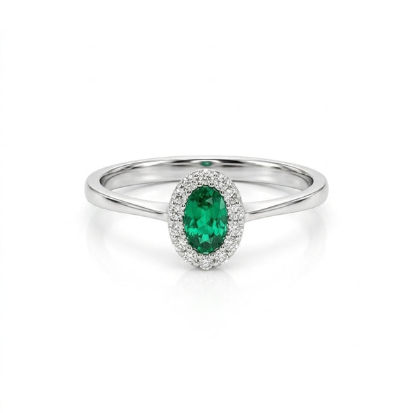ANILLO ESMERALDA OVAL Y ORLA DE DIAMANTES