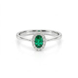 ANILLO ESMERALDA OVAL Y ORLA DE DIAMANTES
