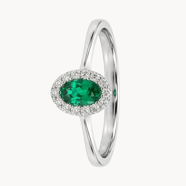 ANILLO ESMERALDA OVAL Y ORLA DE DIAMANTES