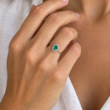ANILLO HALO DOBLE DE DIAMANTES CON ESMERALDA