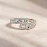 CROSSOVER RING WITH BAGUETTE AND PRINCESS-CUT DIAMONDS