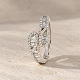 CROSSOVER RING WITH BAGUETTE AND PRINCESS-CUT DIAMONDS