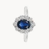 ANILLO ROSETON OVAL ZAFIRO Y DIAMANTES CON ENGASTE ILUSION