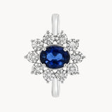 ANILLO ROSETON OVAL ZAFIRO Y DIAMANTES CON GARRAS DE ILUSION